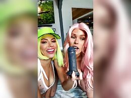 Two Sexy Chicks Play With A Dildo And Put It Deep In Their Mouths
