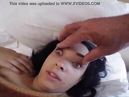 She's Sleeping And He Checks Her Eyes