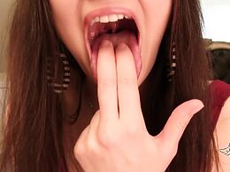 She Opens Her Mouth As Wide As She Can