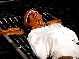 She is tortured in a straitjacket