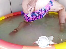 Sissy Slut Sharon Plays With Her Doll in the Pool. Sharon The Sissy Whore Series, Num