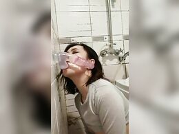 Asian woman swallows the plastic dildo