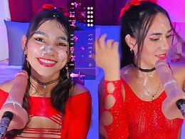 Two sluts suck a dildo in front of you